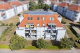 Gebäudeansicht - INVESTIEREN SIE CLEVER // Über 4% Rendite // 2 Zimmer mit Balkon, Einbauküche und TG-Stellplatz